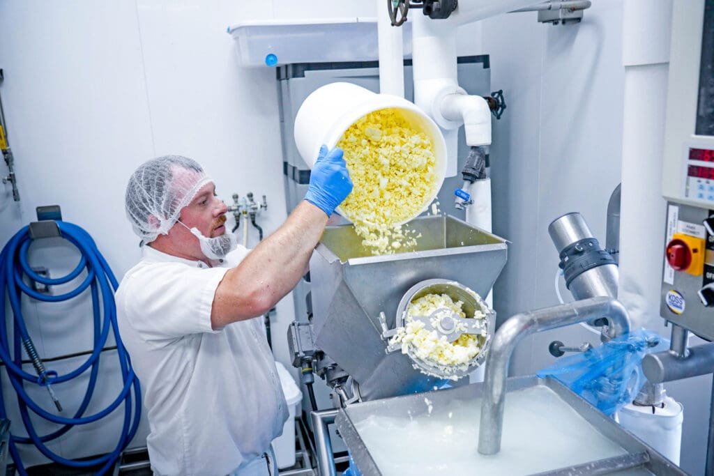 Adding Mozzarella to the Cheese Cooker